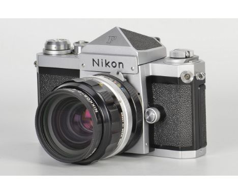 A Nikon F Eyelevel SLR Camera, chrome, serial no. 7296488, with Nikkor-O.C f/2 35mm lens, black, serial no. 835512, body, E, 