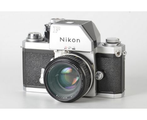 A Nikon F Photomic FTn SLR Camera, chrome, serial no. 6737839, with AIS f/1.8 50mm lens, black, serial no. 3297173, body, VG-