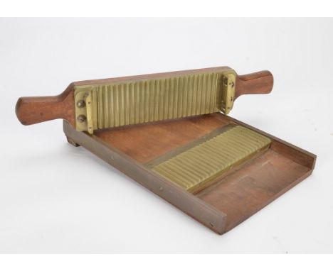 A mahogany and brass Pill Roller, brasswork stamped ‘5 Grains’, 320mm long, G 