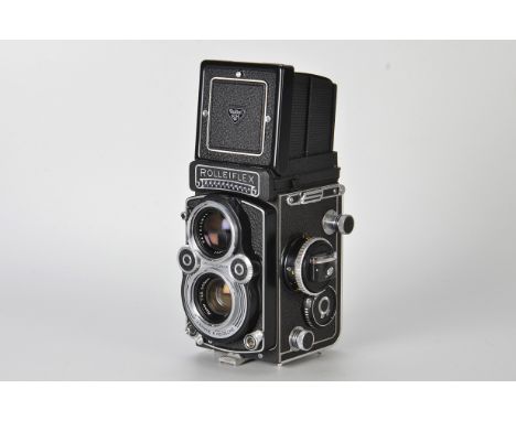 A Rolleiflex 3.5F TLR Camera, black, serial no. 2815179, with Carl Zeiss Planar f/3.5 75mm lens, serial no. 4257882, body, VG