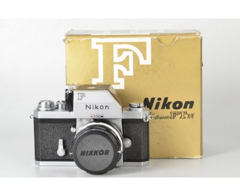 A Nikon F Photomic FTn Camera, chrome, serial no. 7322062, with Nikkor-H f/2 50mm lens, chrome, serial no. 2051402, body, E, 