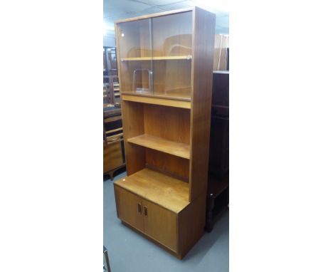 CIRCA 1960's TEAKWOOD LARGE FOUR PART DISPLAY SIDE UNIT, A DROP LEAF DINING TABLE AND SIX LADDER BACK CHAIRS 