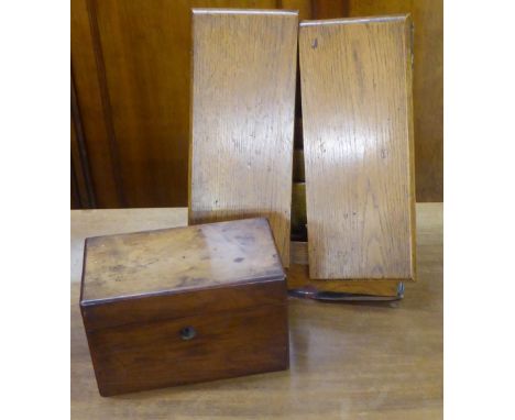 OAK DESK TOP STATIONARY RACK, THE SLOPING FRONT ENCLOSED BY TWO HINGED DOORS (HINGES FAULTY) 10" WIDE, 12 1/2" HIGH AND A NIN