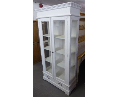 A WHITE PAINTED WOOD KITCHEN CABINET, ENCLOSED BY TWO DOORS, ENCLOSING THREE SHELVES, GLAZED SIDE PANELS, TWO SHORT DRAWERS B