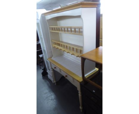 A FARMHOUSE STYLE PAINTED AND BLONDWOOD DRESSER, THE TWO TIER RAILED PLATE RACK ABOVE AN ADVANCED DRESSER BASE WITH TILE TOP,