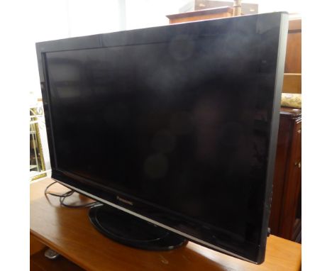 PANASONIC VIERA FLAT SCREEN TELEVISION, A PHILIPS VHS RECORDER WITH REMOTE CONTROLS AND THE WOOD EFFECT STAND 