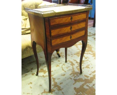 PETITE COMMODE, late 19th century French rosewood and kingwood with a pierced brass gallery and a marble top over three small