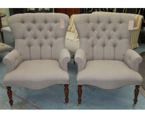 ARMCHAIRS, a pair, in taupe linen upholstery with button backs on hardwood turned supports with brass castors, 83cm W. (2)