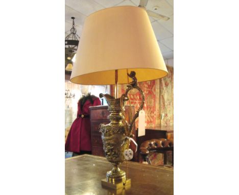 DECORATIVE EWER LAMP, late 19th/early 20th century gilt metal with cherub detail and shade, 96cm H overall (adapted). 