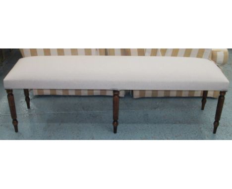 LONG STOOL, with stuff over fawn linen covered seat on reeded legs, 152cm x 40cm.