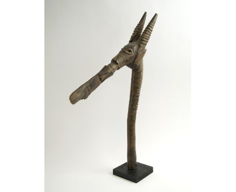TRIBAL HORSEHEAD CARVING, West African, possibly an axe, 53cm H, on block stand. 