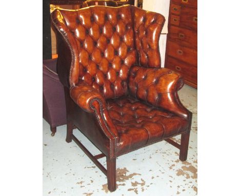 WING ARMCHAIR, George III design deep button tan brown leather upholstered with square supports, 85cm W. 
