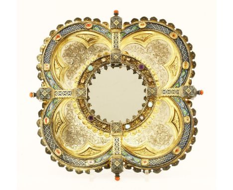 A French Gothic parcel-gilt silver and enamel mirror,Paul Brunet, Paris, c.1870, of quatrefoil form, the circular central mir