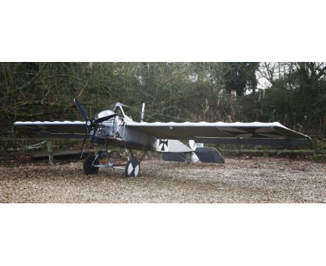 A scratch built, near life-size, model of a Fokker Eindecker E111,fitted with a Reliant Robin engine and finished in German F