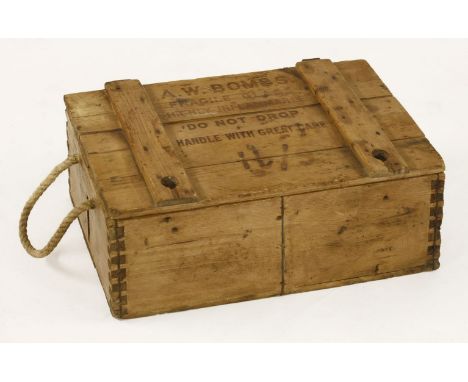 A Second World War pine AW (phosphorus) incendiary grenade box, the lid branded 'A.W. BOMBS, FRAGILE GLASS, HIGHLY INFLAMMABL