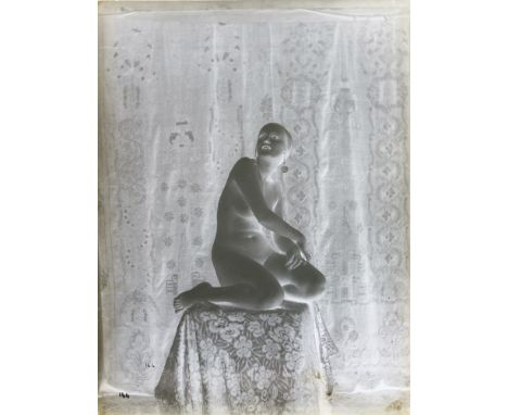A quantity of erotic half, third and quarter size glass negative plates,mid-20th century reprints of early 20th century image