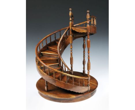 An unusually large architectural model of a spiral staircase,French, c.1880, constructed of fruitwood with sixteen steps, wit