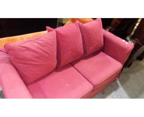 A loose covered sofa bed