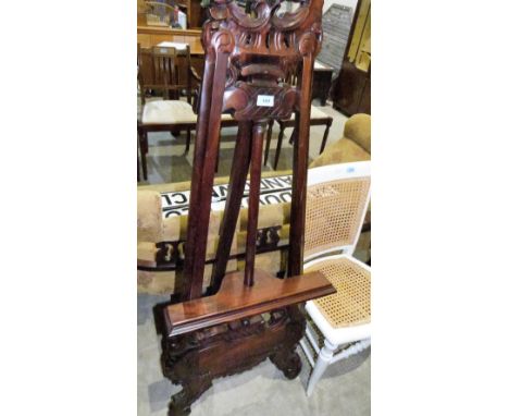 A carved hardwood easel