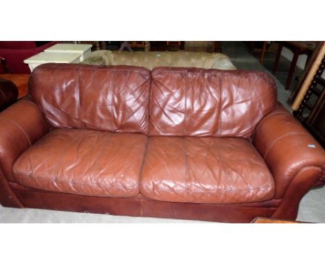 A leather sofa. 92'' wide