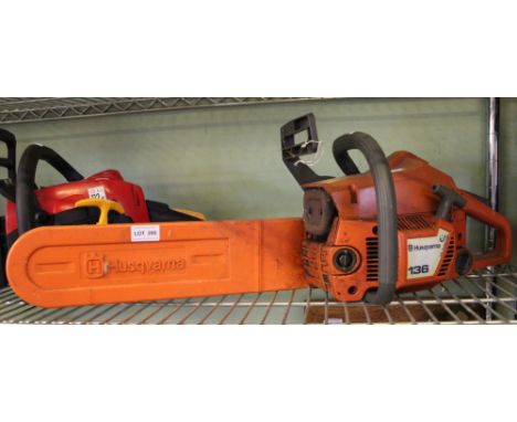 A "Husqvarna" 136 petrol powered chainsaw