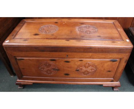 A 20th century oriental style camphor wood trunk