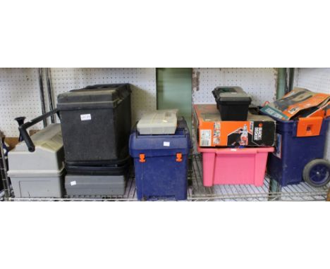 A shelf containing a large selection of tools &amp; tool boxes