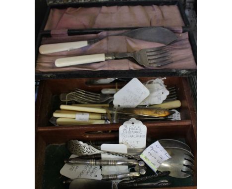 A drawer containing a selection of silver plate flatware, cutlery, etc