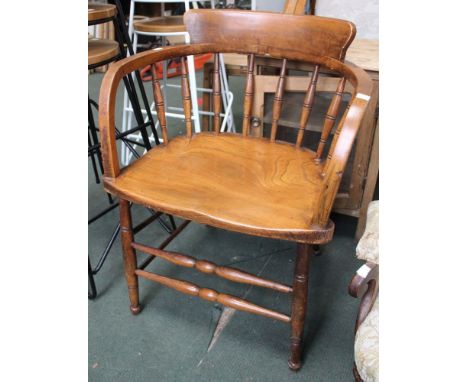 A bow back Windsor armchair single spindle comb, ash and elm