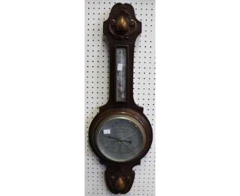 A vintage banjo wooden barometer
