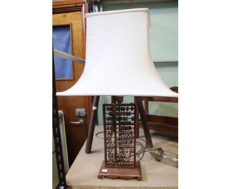A hardwood Oriental Abacus style lamp base with shade&nbsp;