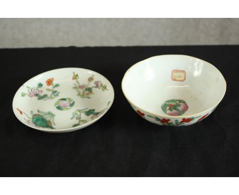 A Chinese porcelain bowl and saucer dish, decorated with panels of flowers, with seal mark, wax seal and paper labels to base