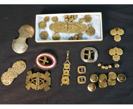 A collection of Danish brass and gilt metal traditional traditional folk costume buckles, buttons and coin pendant, one with 