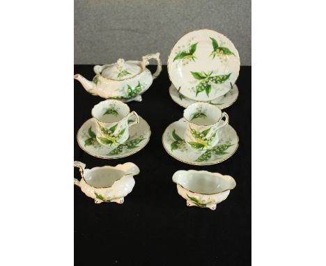 A 20th century Hammersley &amp; Co two person breakfast set, decorated with flowers, marks to base. H.10 W.20 D.13cm. (larges