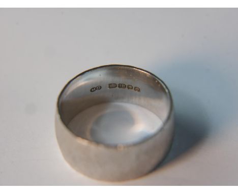 A textured effect 18 carat white gold ring. Size O 1/2, 9.6g gross weight 