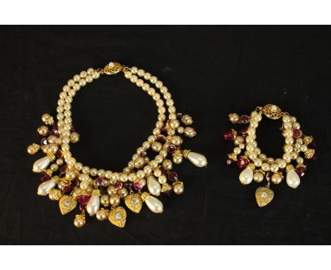 A vintage possibly Christian Dior faux pearl and pink Swarovski tassel necklace and matching bracelet, in a Christian Dior fa