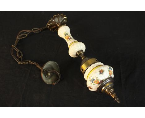 An early 20th century porcelain and brass ceiling pendant light, decorated&nbsp;with sprays of flowers. L.100cm.