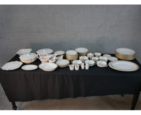 A Spode Fleur de Lys pattern part dinner and teaset comprising of plates, bowls, cups and saucers etc. H.4 W.37 D.29cm Larges