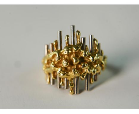 A mid 20th century David Thomas 18 carat yellow and white gold modernist design ring. Ring size O, 9.9g gross weight. 