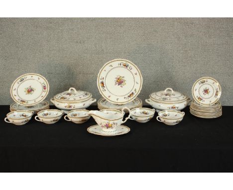 A Spode Rockingham part dinner service to include plates, soup bowls, lidded tureens and sauce boat. H.15 W.28 D.23cm. (large