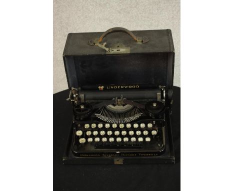 An early 20th century cased Underwood manual typewriter. H.12 W.31 D.26cm. 