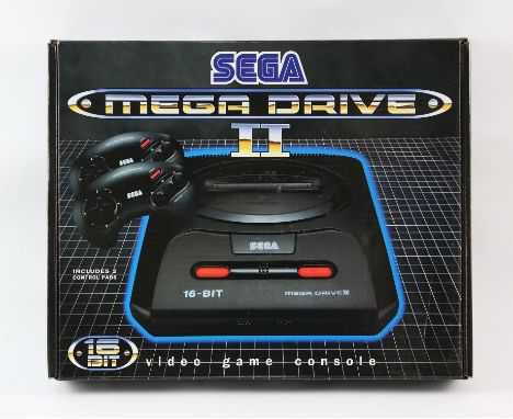 SEGA Mega Drive 2 - New - Boxed and Unused. This lot contains a boxed Mega Drive Model 2 - the console has never been used an