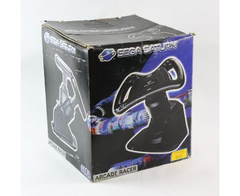 SEGA Saturn Arcade Racer - Boxed. This lot contains the SEGA Saturn Arcade Racer - a steering wheel for arcade racers. Proven