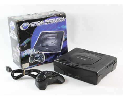 Sega Saturn Console - Boxed. This lot contains a fully working Sega Saturn. This consoles comes with the model 1 controller. 