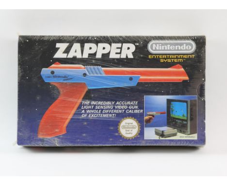 NES Zapper - New & Sealed Nintendo NES. This lot contains a sealed NES Zapper specifically used for the original NES.Provenan