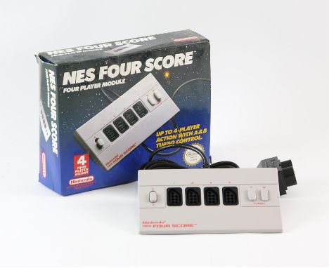 NES Four Score - Four Player Module - Boxed This contains a boxed and hardly used NES Four Score - this device allows for 4 p