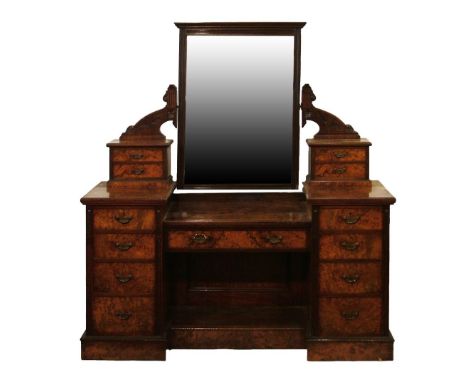 En-suite kneehole drop centre dressing table, the raised back fitted swing mirror and four trinket drawers, the base fitted s