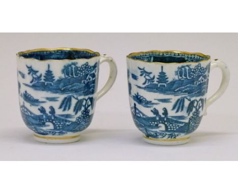 Pair of 18th Century Caughley coffee cups, each having gilt highlighted blue and white transfer printed decoration depicting 