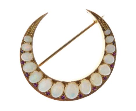 Opal and ruby crescent brooch, marked A & Co and '15ct', the fifteen graduated opal cabochons with ruby points to the outside