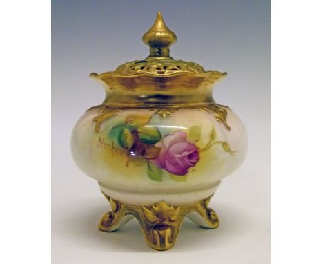 Royal Worcester squat jar and cover by Mildred Hunt, painted with roses, the domed cover with pierced decoration, base with p